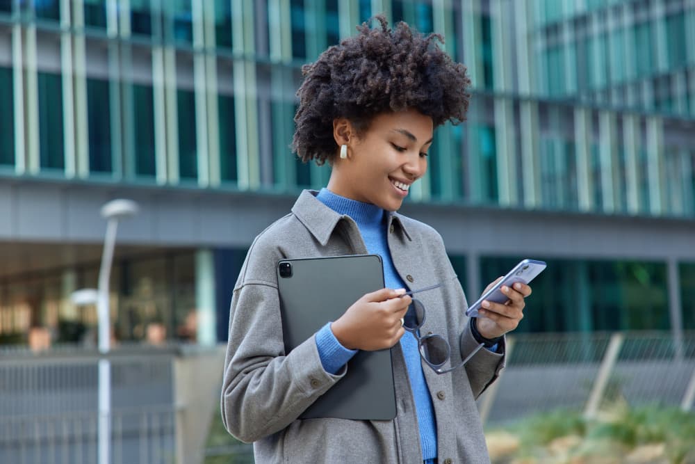 Person sending money on mobile phone